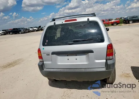 2004 Ford Escape Xlt z USA, uszkodzony, nr VIN 1FMYU03154KB52292